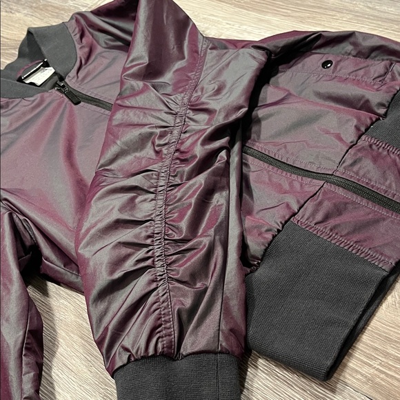 Puma Iridescent Bomber
Jacket In Plum Jacket with Black Trim Size Small - Picture 6 of 11